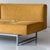 c. 1990s. Italy. Yellow alcantara fabric with metal base. One side turns into backrest. This piece is attributed to the...