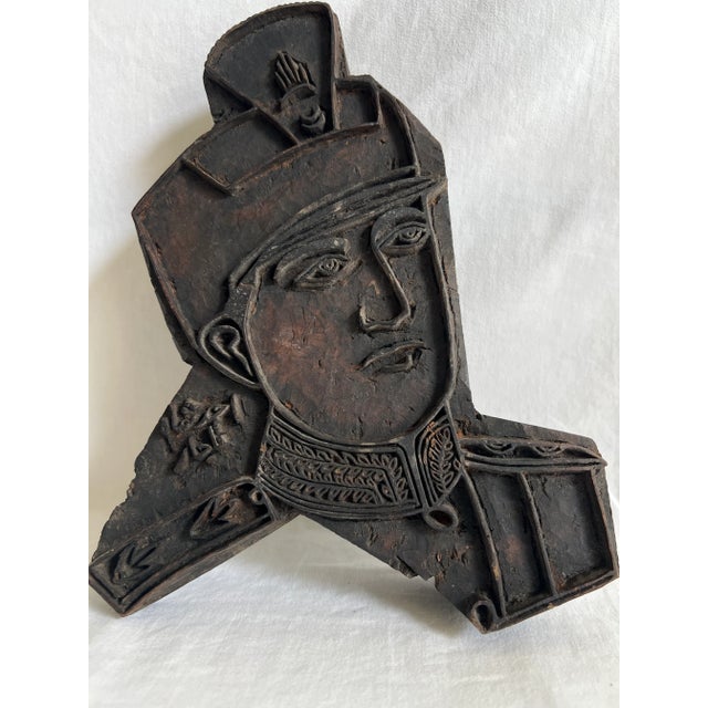 Two hand-carved Indian wooden printing blocks, also known as Indian fabric stamps or textile printing blocks. These blocks...