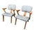 A striking pair of American mid-century modern armchairs made by the Custom & Modern Upholstering Co. of Gardner,...