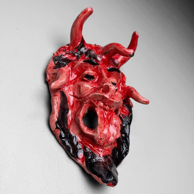 An expressive ceramic wall mask from Seminara, the renowned ceramic village in Calabria, made by Gennaro Condurso, a...