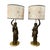 Of French origin made in the 19th century, they represent two caryatids in patinated bronze, this type of lamp known as...