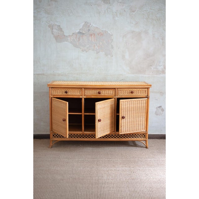 Bamboo and Rattan Sideboard – 1970s Product details Bamboo structure with three drawers and three doors. Entirely covered...