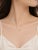 Estate 14K yellow gold slide pendant necklace featuring 14 brilliant round diamonds (0.07 ct) and 21 champagne diamonds...
