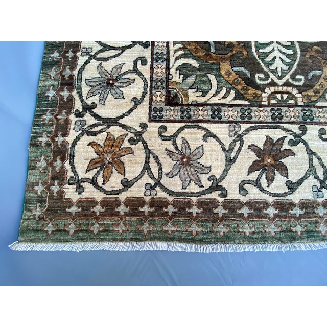 This handmade Afghan rug showcases a refined Persian Heriz–Bakhtiari lattice design, featuring repeating medallions...