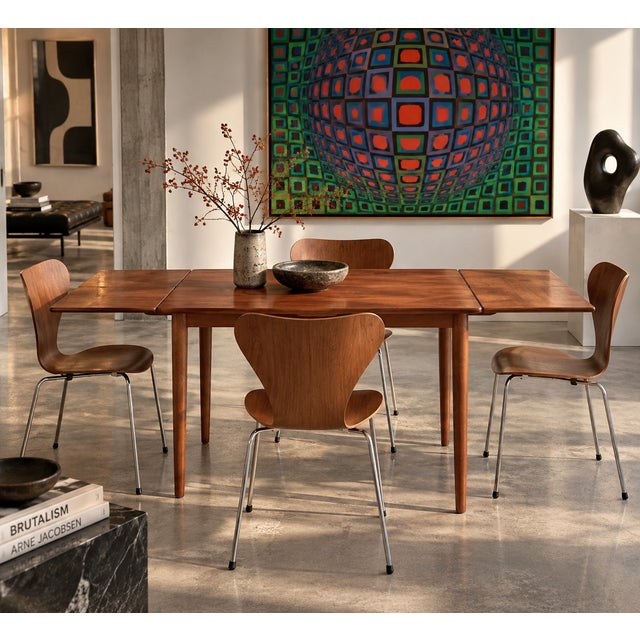 Danish extendable dining table in teak, c. 1960s. a compact and well-proportioned danish dining table with a rectangular...