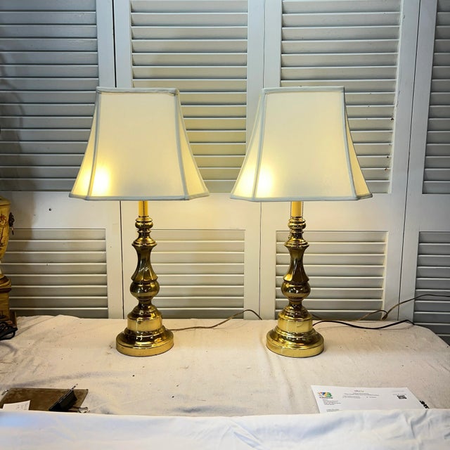 For consideration a pair of double bulb bass lamps with twist column. Sockets have independent pull chains for use of one...