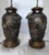 Bring timeless elegance and artistic craftsmanship to your space with this striking pair of antique Japanese bronze table...