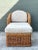 This vintage lounge chair and ottoman set brings the warmth and tactile character of mid-century rattan into a relaxed,...