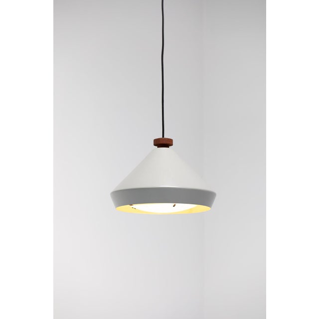 The lamp can be positioned in multiple ways thanks to the counterweight construction, the extendable brass tube arm and...