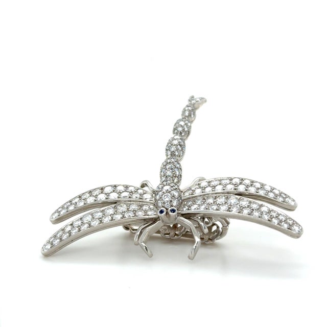 This whimsical necklace enhancer by Tiffany and Co. features a diamond pavé dragonfly with approximately 5.75 carats of...