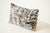 Artistic and expressive, this rectangular lumbar pillow features an abstract painterly pattern in white, brown, and black....