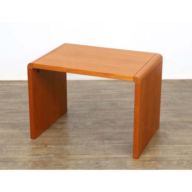 Enhance your living space with this exceptional Danish Mid-Century Modern side table, masterfully crafted by the renowned...