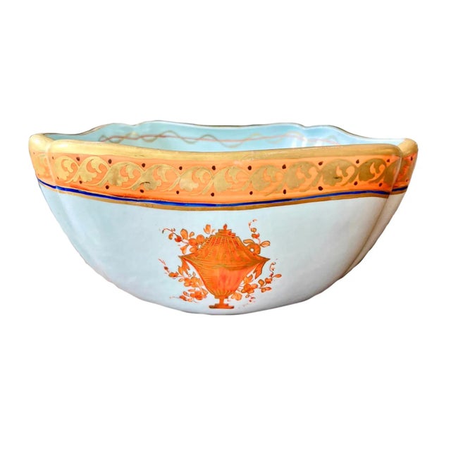 Rare Mottahedeh "Lowestoft" centerpiece bowl. Made of glazed porcelain with a slightly blue ground with russet trim,...