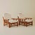 A pair of lounge chairs by Maison Regain, crafted in solid wood with newly upholstered cushions. Each chair is defined by...