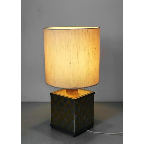 Abat jour of italian design, in two-tone chrome metal, silvered and gilded origin italy period 1970s. material two-tone...