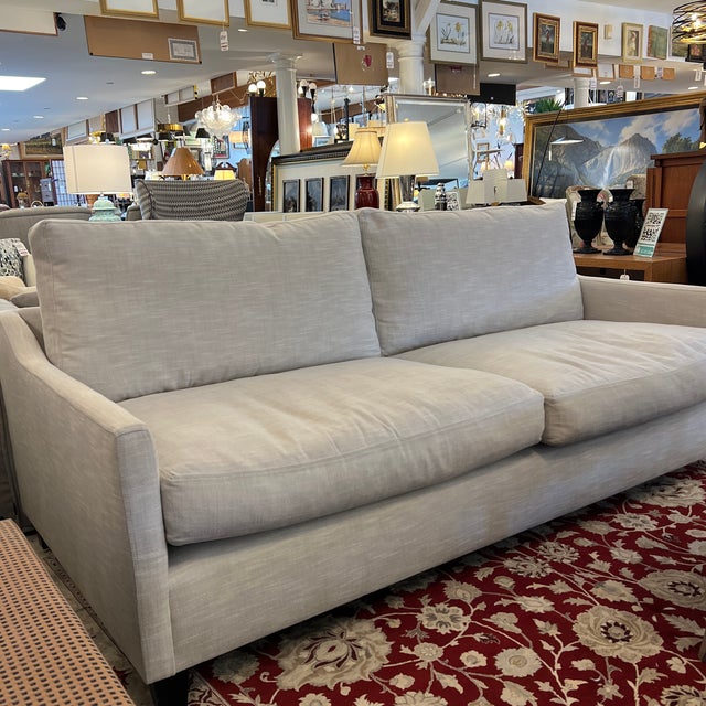 Design Plus Gallery presents a Slope Arm Sofa from Moss Studio. The sofa has the cool, laid back California coastal style...