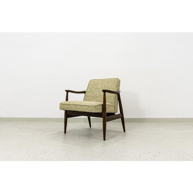 A gfm-87 armchair designed by juliusz kędziorek, manufactured at the gościcińska fabryka mebli (gfm), poland, in the...
