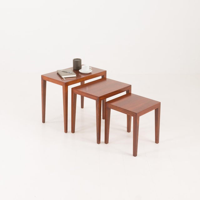 A simple yet elegant set of nesting tables, model 163, designed by severin hansen for haslev møbelsnedskeri in denmark in...