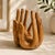 Extremely unique vintage hand carved wooden sculpture featuring two stylized hands forming an open bowl shape. Beautiful...