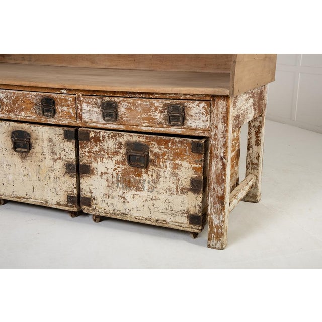 19th century french pine bakers table with storage bins. this interesting table has distressed paintwork to the lower...