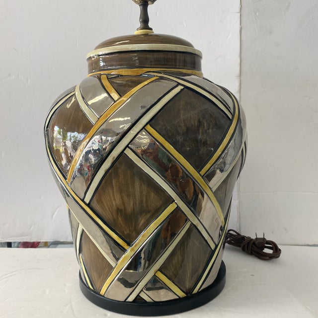 Great 1970s style lamp with silver and white cross stripes has a great design for your retro modern interior.