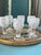 Rare Bijou-Scale Uniform Set of 6 Matching 19th Century Cut-to-Clear Cordials on Base Tray A spectacular, investment-grade...