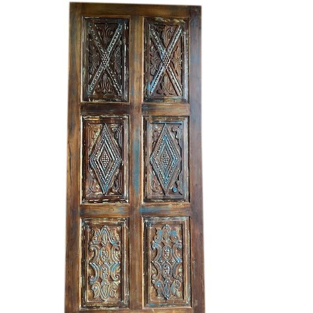 Decorate your home with a stunning hand-carved flowers door, studded with copper nails to accent the carvings. Healing...