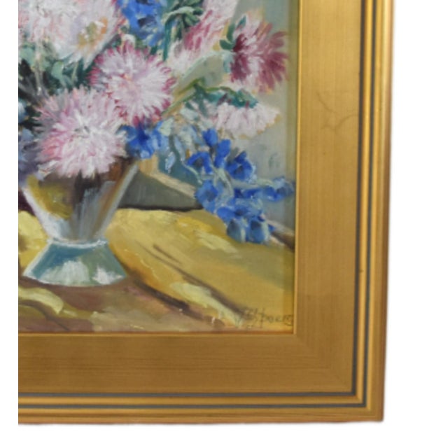 Vintage oil painting on artist canvas panel, of a beautiful vase of colorful flowers. Signed by the talented artist “V...