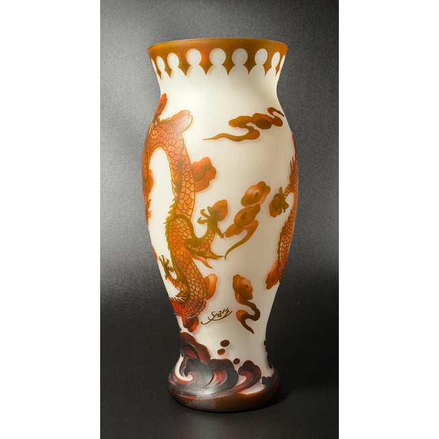 A spectacular 15.5-inch multi-layered cameo glass vase crafted in the Art Nouveau tradition of Émile Gallé. This imposing...