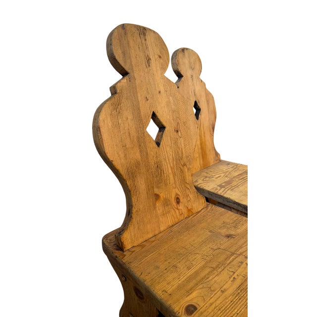 Set of rustic fir wood chairs, entirely hand-carved, with shaped backrest and perforated lozenge decoration. A classic of...