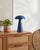 Illuminate your space with the chic and portable Umbra accent table lamp, a beacon of minimalist modern style. Standing at...