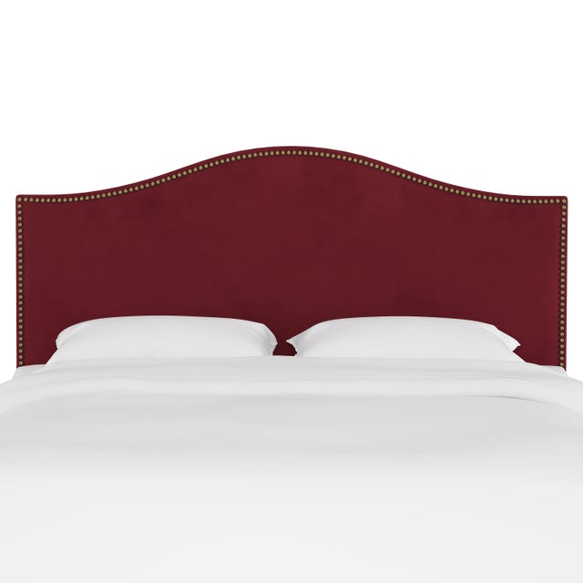 Give your interior a lift with the Headboard. Featuring the delicate curves of a classic camelback design, with subtle...