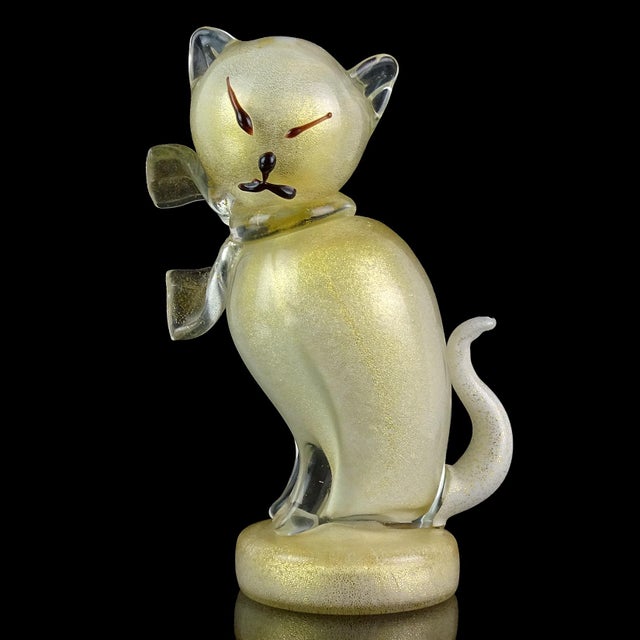 Beautiful vintage Murano hand blown white and gold flecks Italian art glass kitty cat sculpture figurine. The piece is...