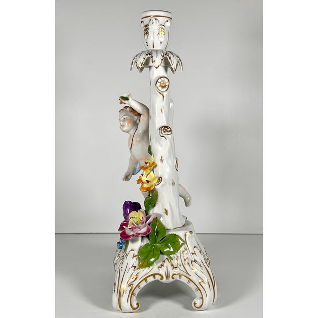 Antique Dresden Porcelain Candlestick for your consideration. The candlestick measures approx. 13 1/8 inches tall, 6...