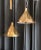 A pair of large pendants designed by Paavo Tynell for Taito Oy, Finland, circa 1950th. Polished perforated brass shades...