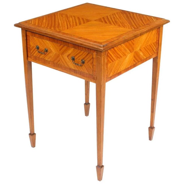 A beautiful antique Victorian satinwood occasional table with an unusually large drawer, circa 1880. This exquisitely...