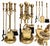 Vintage brass fireplace tool set in Hollywood Regency style with elegant turned handles and classic proportions. The aged...