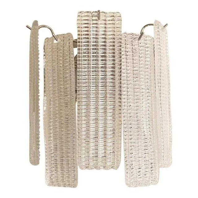Contemporary ”diamond listelli ” murano glass wall sconce. transparent and rectangular strips “listelli ” elements of...
