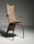 Post-modern style chair. Hammered metal back with a bronze appearance. Presumably from france, ca. 1980-1990. Dimensions:...