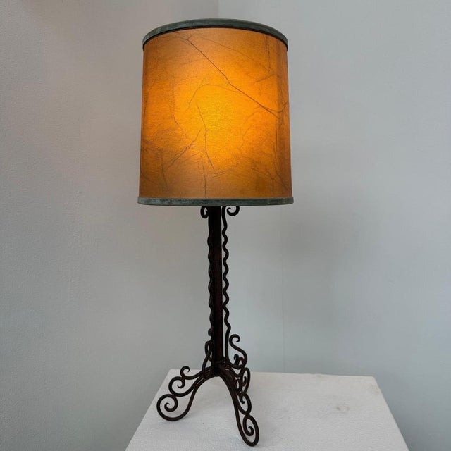 Amsterdam School Table Lamp in Wrought Iron with Parchment Shade 1930s A sculptural table lamp in hand forged wrought...