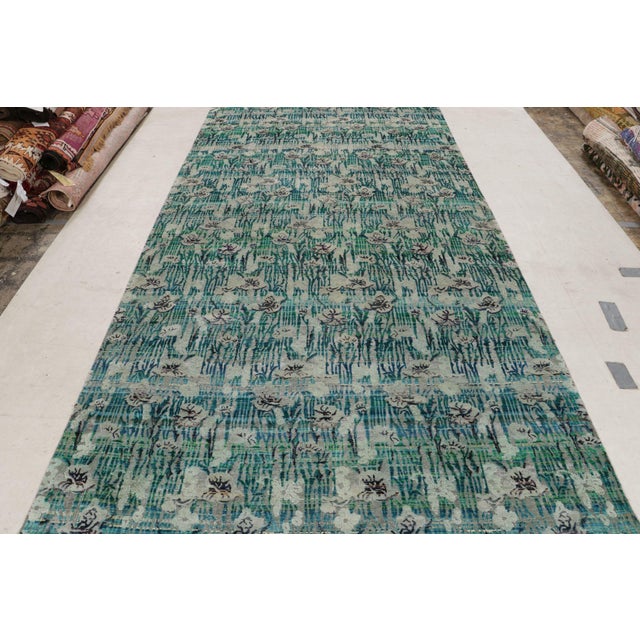 Hand knotted in pure 100% silk, this floral rug represents the latest additions to the New & Modern Collection by Rug &...