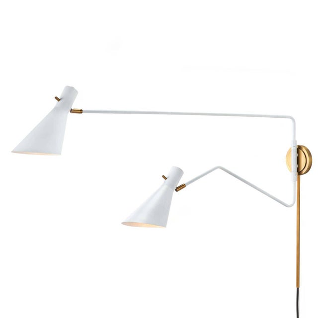 Add a modern statement with this unique pin up or installed lighting piece. Spyder's two adjustable arms are each unique...