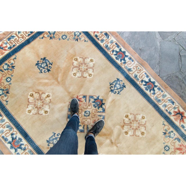 ✂ - - - - - m e a s u r e m e n t s: 6’ x 9’, 183cm x 275cm, 50 Lbs C O L O R S Base: beige/tan Accents: blue, ivory,...