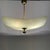 This is a lovely chandelier with a classic look. It's from the 1950s, so it's a bit dated, but that only adds to its...