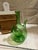 Up for consideration is a beautiful green glass decanter. This would look lovely on display in your home and it is a great...