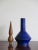 This vase in ceramic is turned and engraved by hand with matt enamel. It features a solid wood stopper and is a new design...