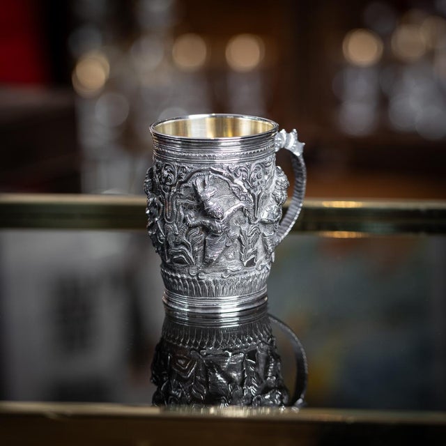 Antique late 19th Century Burmese solid silver "Jataka Tales" mug, crisp and highly decorative, chased and repoussé with...