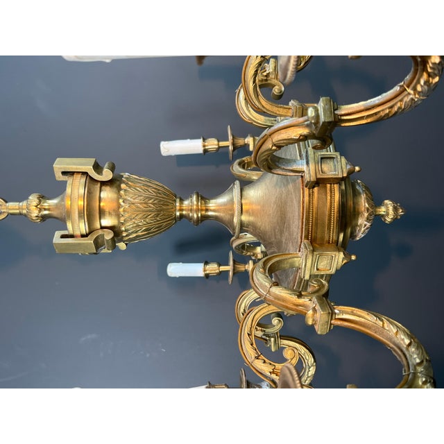 Bronze 1940s Louis XVI style 8-arm chiseled bronze chandelier by Lucien For Sale - Image 8 of 12