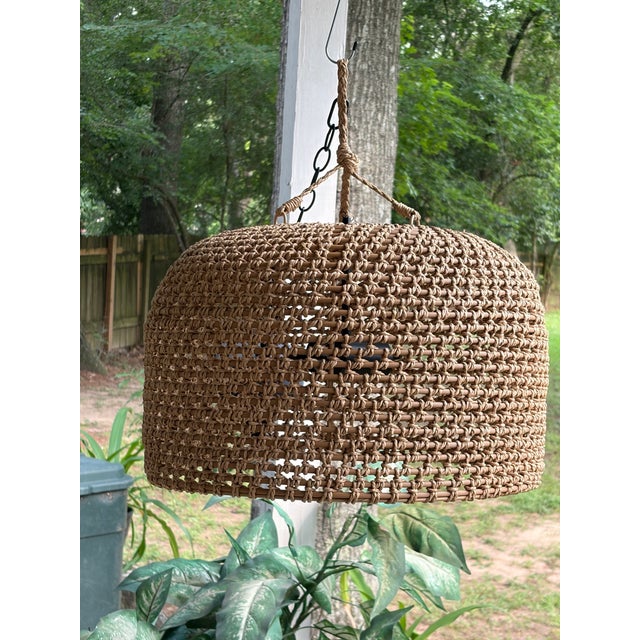Great hanging lamp with a basket weave style. Holds 2 light bulbs for additional styling and has chain. Ready to hang