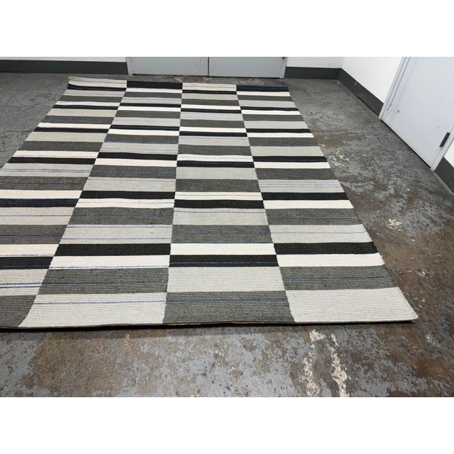 Design Plus Gallery presents a 8ft x 10ft Epoch Time 1 Area Rug from Tai Ping. Hand-tufted by skilled artisans, Time 1 is...